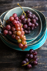 Organic grape on rustic background
