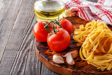 Cutting board with ingredients, selective focus.