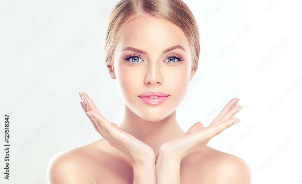 Wall mural beautiful young woman with clean fresh skin . facial treatment . cosmetology , beauty and spa . - Wall murals