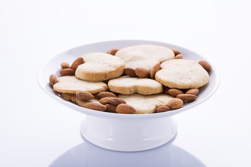 Creamy ice cream with chocolate on a white plate