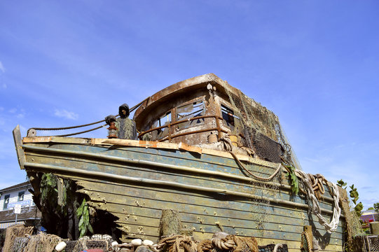 Shipwrecked Boat In A Harbour