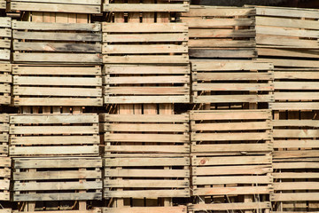 Wooden boxes stacked together. Warehouse empty wooden containers