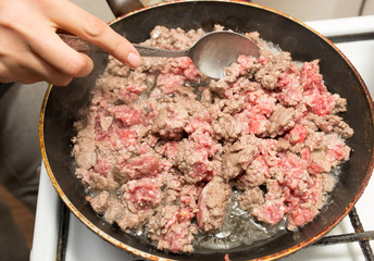 beef fried in a pan