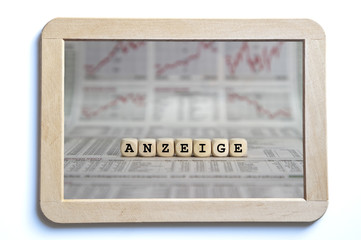 advertisement word built with letter cubes