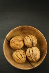 Super foods for human brain. Nuts on a wooden table. Walnuts
