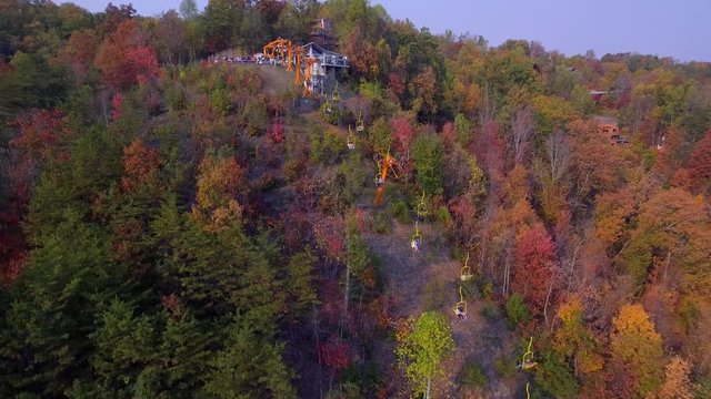 Aerial video of people riding the Gatlinburg Sky LIft up the mountain