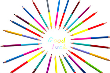 colored pencils on white background