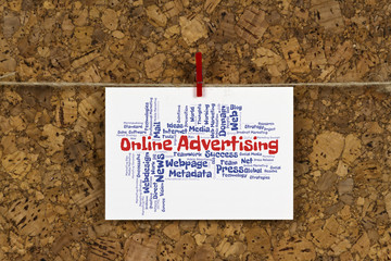 Online Advertising word cloud on business card pinned up on cork board