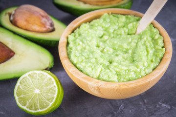 avocado Guacamole on molcajete real Mexican traditional procedur