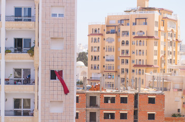 Curtains blowing in the wind outside the window