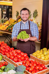 Man offers fresh salad.