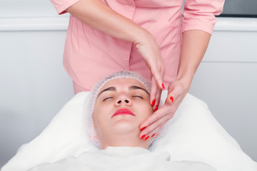 Fototapeta na wymiar Young woman getting spa treatment at beauty salon