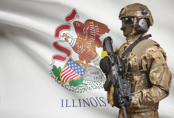 Soldier in helmet holding machine gun with USA state flag on background series - Illinois