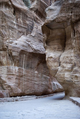 Fototapeta na wymiar Petra canyon called the Siq that leads to the Nabatean city, Jordan