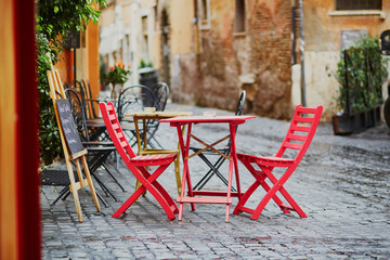 Fototapeta na wymiar Cozy outdoor cafe in Rome, Italy