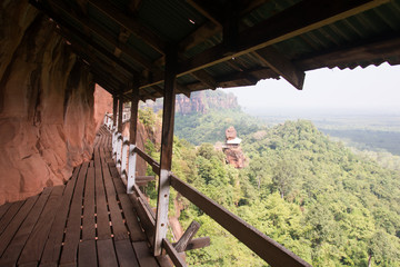 wood bridge on mountain cliff at Phutok, Thailand..