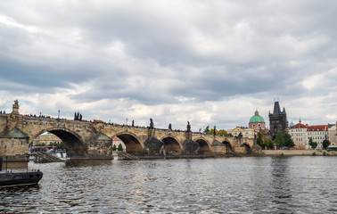 Czech Republic, Charles Bridge across Vltava river on which the ship sails