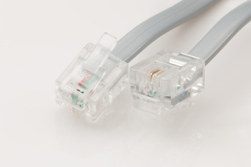 Telephone cable connector ends.