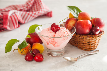 ice cream, berries and fruit on a table, selective focus