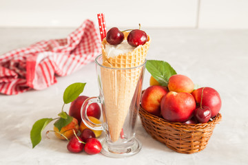 ice cream, berries and fruit on a table, selective focus