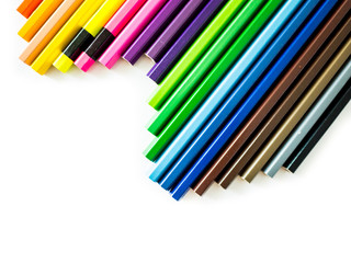 Colorful pencils on white background