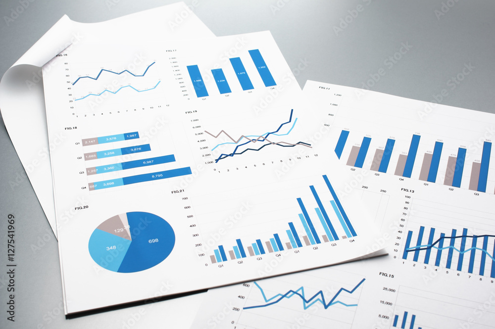 Aufkleber financial reports. graphs and charts. documents on gray reflection background.