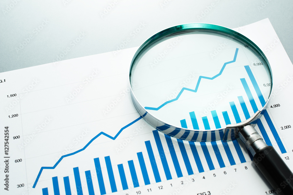 Aufkleber reviewing financial report. looking at growth chart with magnifying glass. document, chart and magni