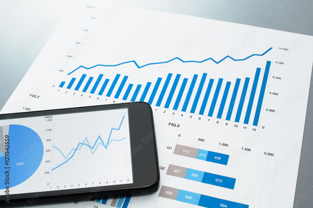 Poster reviewing financial report. document and smart phone.　business document and smart phone on gray refl