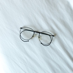 Optical glasses on the bed
