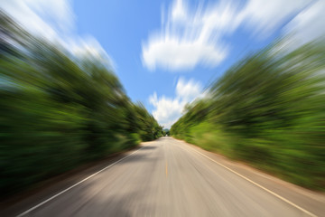 Empty asphalt blurry road