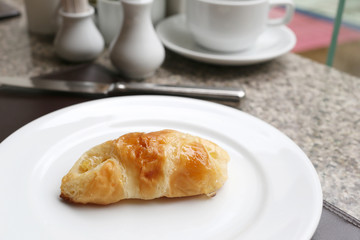 dessert baked or fruit bread on white dish.