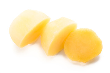 Boiled sliced potatoes isolated on white background.