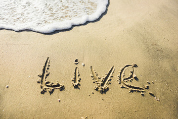 Life. message on the beach.