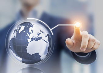 Worldwide business concept, 3D globe interface, businessman touching button