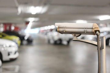 CCTV camera digital video recorder in car park.