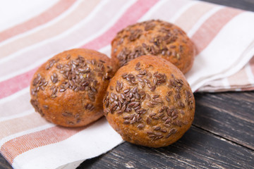 rye bread buns with flax seeds