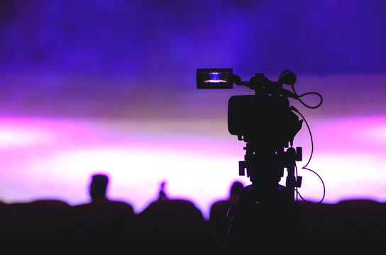 Video Recorder Silhouette In Front Of Stage before Show Begins