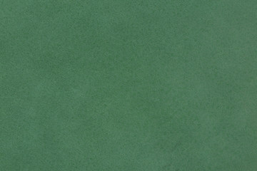 Texture of natural green luxury leather.