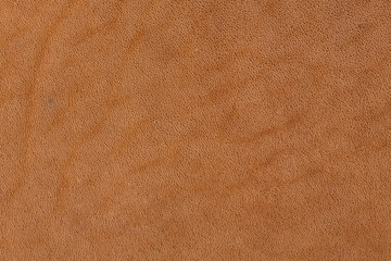 Texture of brown leather on macro.