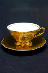 Golden cup of tea