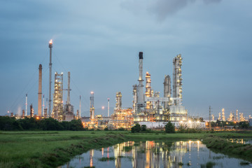 Obraz na płótnie Canvas Oil Refinery factory Petroleum at twilight sunset