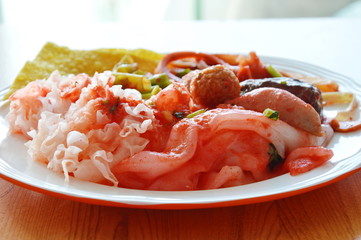 rice noodle with fish and shrimp ball dress red soy sauce