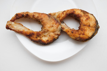 Fried  fish on a white background