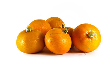 mandarins and Christmas decorations close-up on a white backgrou