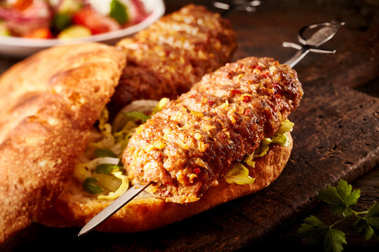 Tasty lamb adana kebab on toasted bread