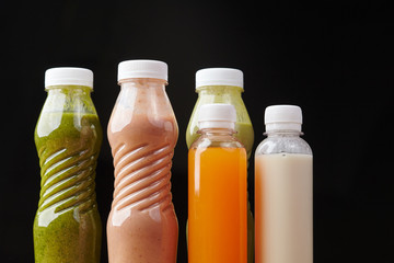 bottles of juices and vegetable smoothies healthy food