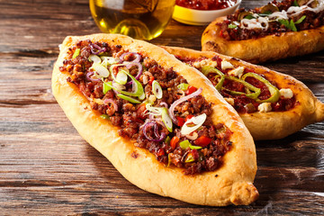 Turkish pide pizza loaves with oil