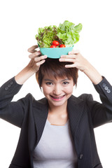 Healthy Asian business woman with salad.