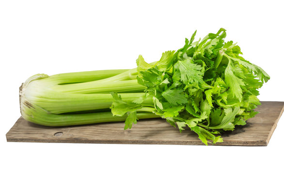 Fresh celery on wooden isolated on white background