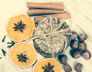 Gingerbread cookies, cinnamon and orange slices. Christmas decoration.